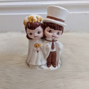Vintage 1979 hand painted bride and groom ceramic figurine.